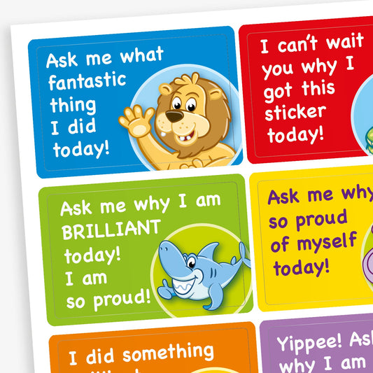 A sheet of rectangular motivational stickers for children, each with a positive message and cartoon character. Messages include: 'Ask me what fantastic thing I did today!' with a waving lion, 'Ask me why I am BRILLIANT today! I am so proud!' with a smiling shark, and 'Ask me why I’m so proud of myself today!' with a cheerful bear. The stickers have colourful backgrounds in blue, red, green, yellow, and orange