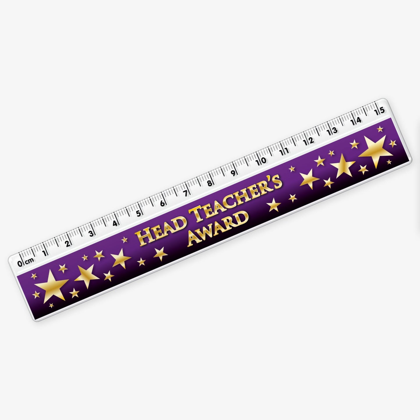 15cm ruler featuring a dark purple background with gold stars; and bold gold text reading 'Head Teacher's Award' along the centre.