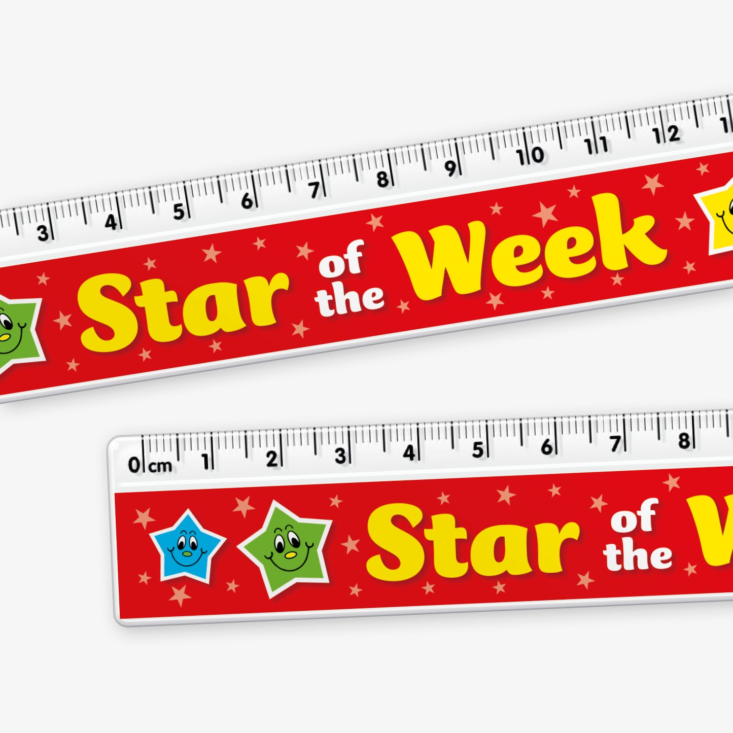 Close up of 15cm plastic ruler with a red background and the phrase 'Star of the Week' in bold yellow text. The design features smiling cartoon stars in various colours and a measuring scale along the top edge.