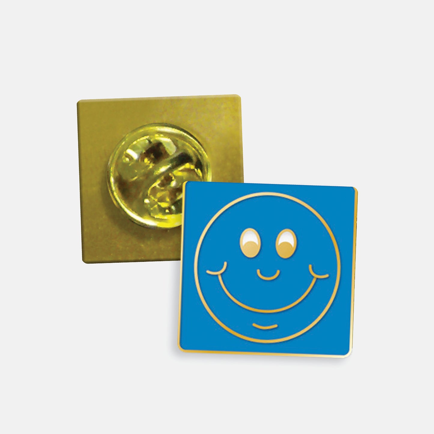 Cyan enamel square badge with a gold smiling face as it's design. The reverse side shows a gold back with a butterflyfastening