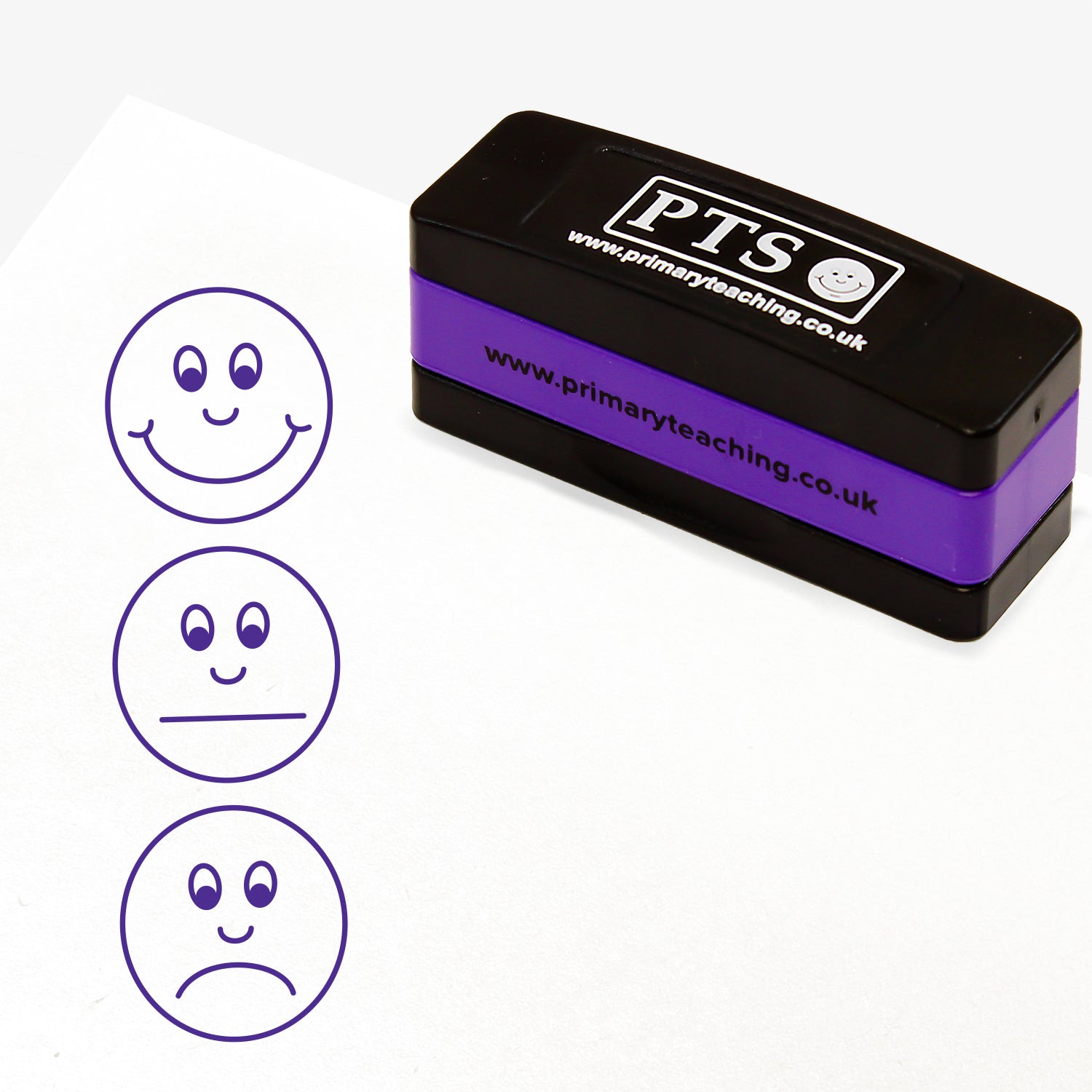 Rectangular self-inking, stackable stamper 44mm x 13mm with purple ink, featuring a vertical image of 3 faces - top one smiling, middle one with a non committal face and the bottom one with a sad face.