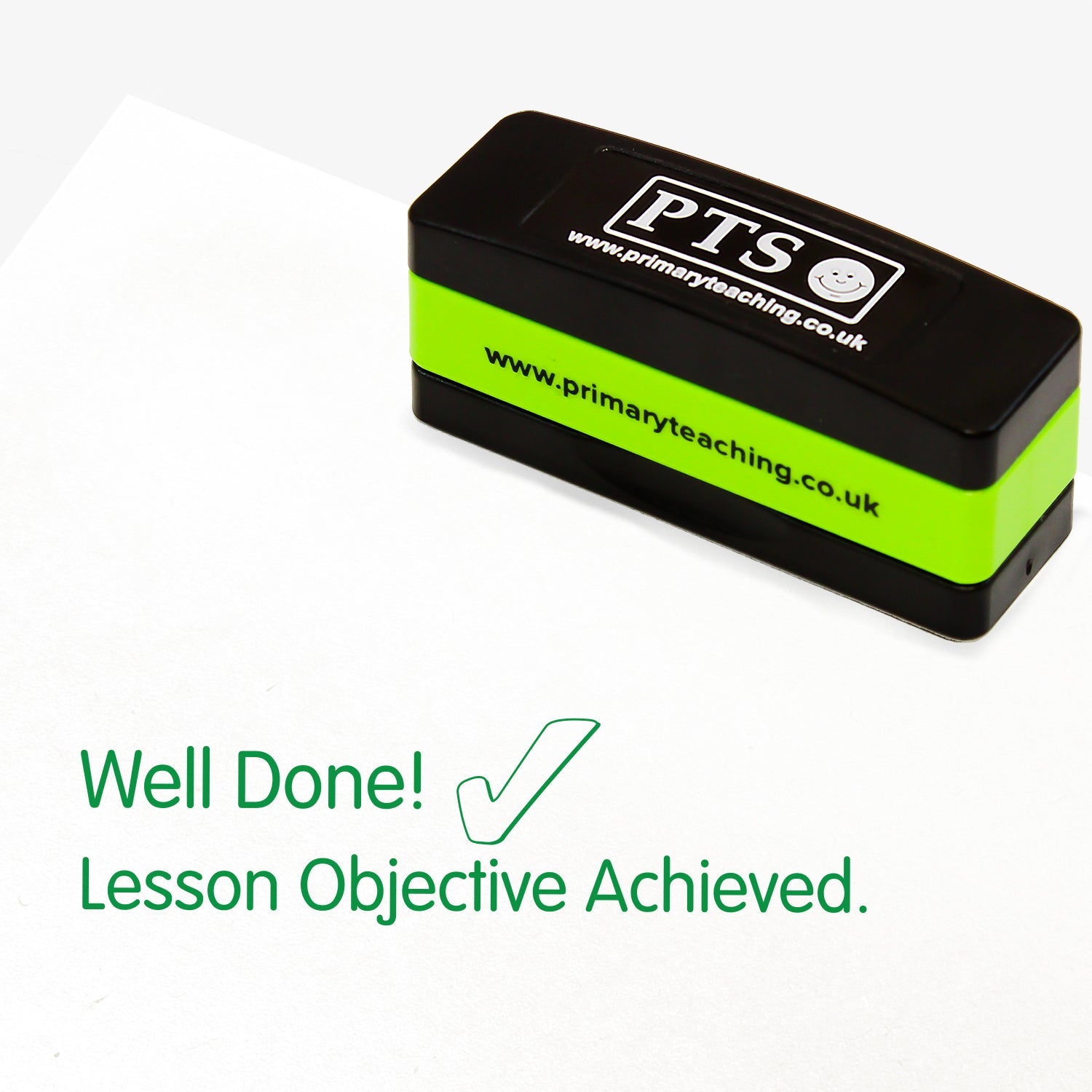 Rectangular self-inking stackable stamper 44mm x 13mm with green ink, displaying the text 'Well Done! Lesson Objective Achieved.' alongside the green outline of a tick.