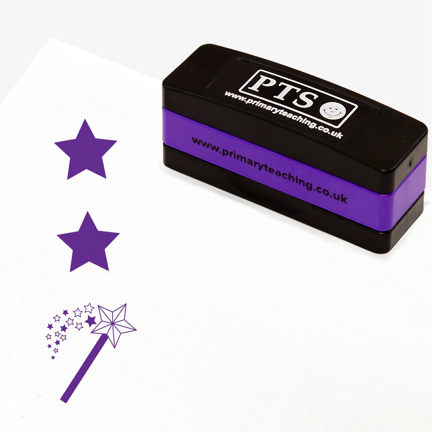 Rectangular self-inking, stackable, stamper 44mm x 13mm with purple ink, featuring a purple vertical impression: a star at the top, a star in the middle and a wand with a shower of stars underneath.