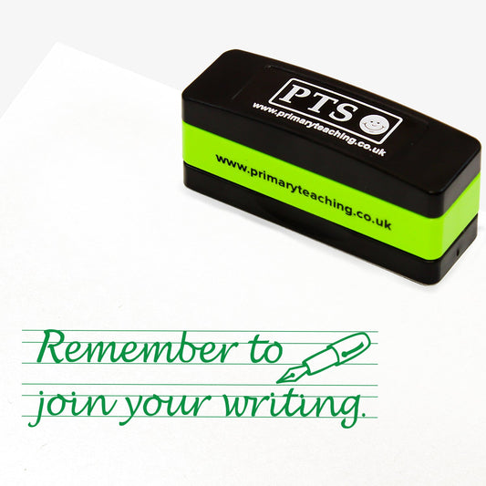 Rectangular self-inking stamper measuring 44mm by 13mm, featuring a green impression lined writing paper of the phrase 'Remember to join your writing.' in joined up writing alongside an image of a fountain pen.