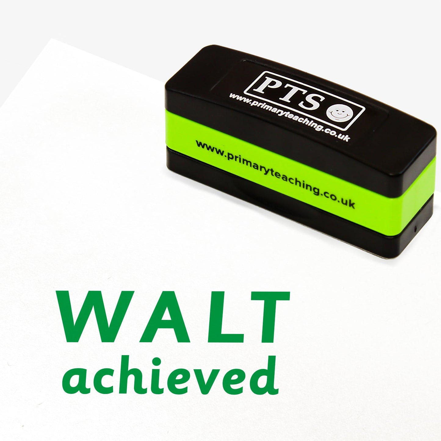 Rectangular self-inking stackable stamper 44mm x 13mm with green ink, displaying the text 'WALT achieved'.