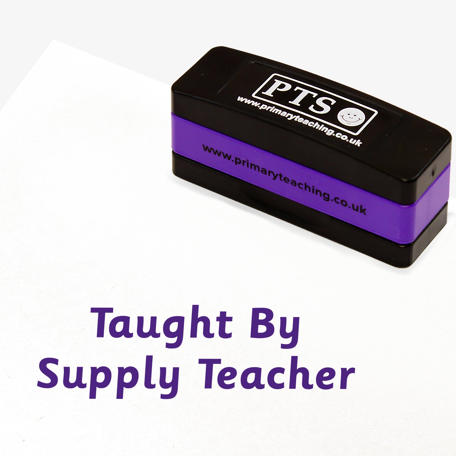 Rectangular self-inking, stackable stamper 44mm x 13mm with purple ink, featuring the phrase 'Taught By Supply Teacher'
