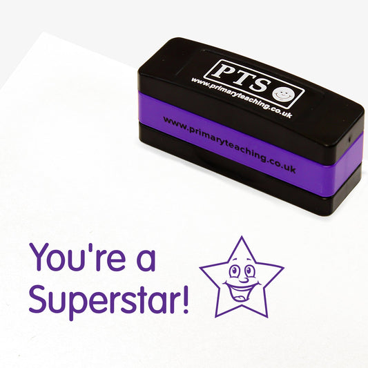 A rectangular, stackable, self-inking stamper, displaying the purple text 'You're a Superstar!' with a smiling cartoon star to the right. Stamper measures 44mm by 13mm