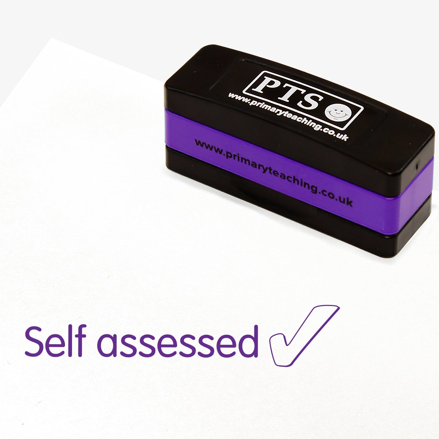 Rectangular self-inking, stackable stamper 44mm x 13mm with purple ink, featuring the phrase 'Self assessed' with a tick outline.