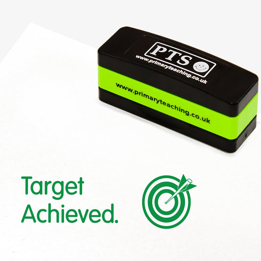 Rectangular self-inking, stackable stamper 44mm x 13mm with green ink, featuring an arrow hitting a bullseye in a target after the phrase 'Target Achieved' 