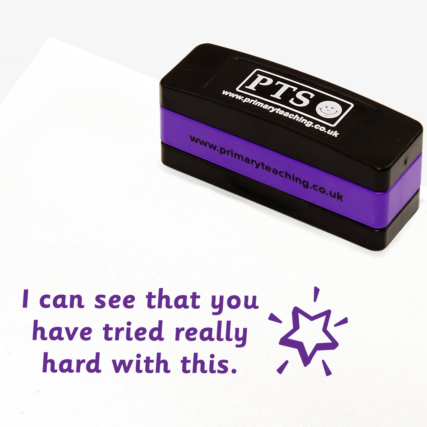 Rectangular self-inking, stackable, stamper 44mm x 13mm with purple ink, featuring the phrase 'I can see that you have tried really hard with this.' across 3 lines of text.  Next to the phrase is a shining star icon.