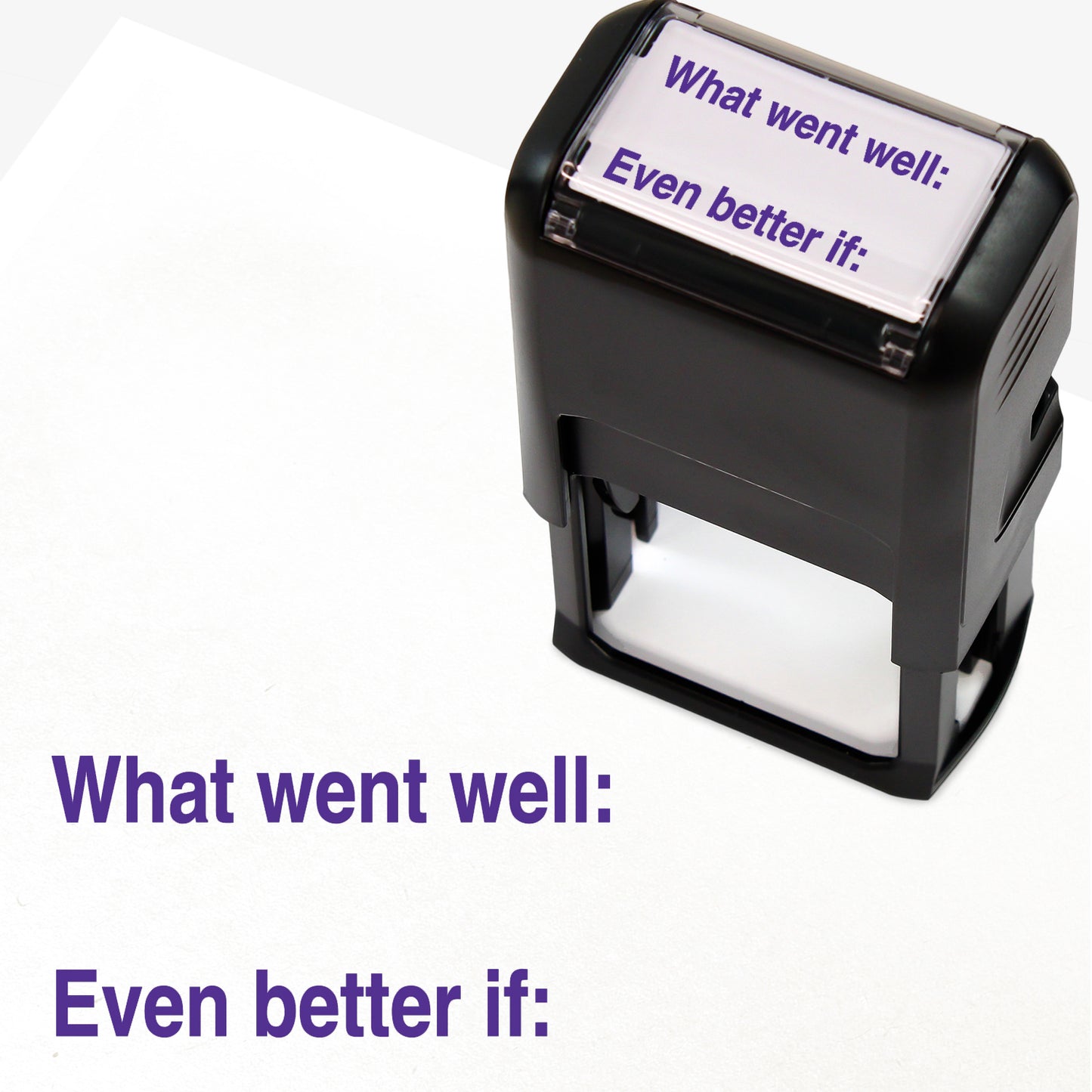 Rectangular self-inking stamper 42 x 22mm with purple ink, displaying 2 lines of text.  The top text 'What went well:' then a space before a bottom line text of 'Even better if:'