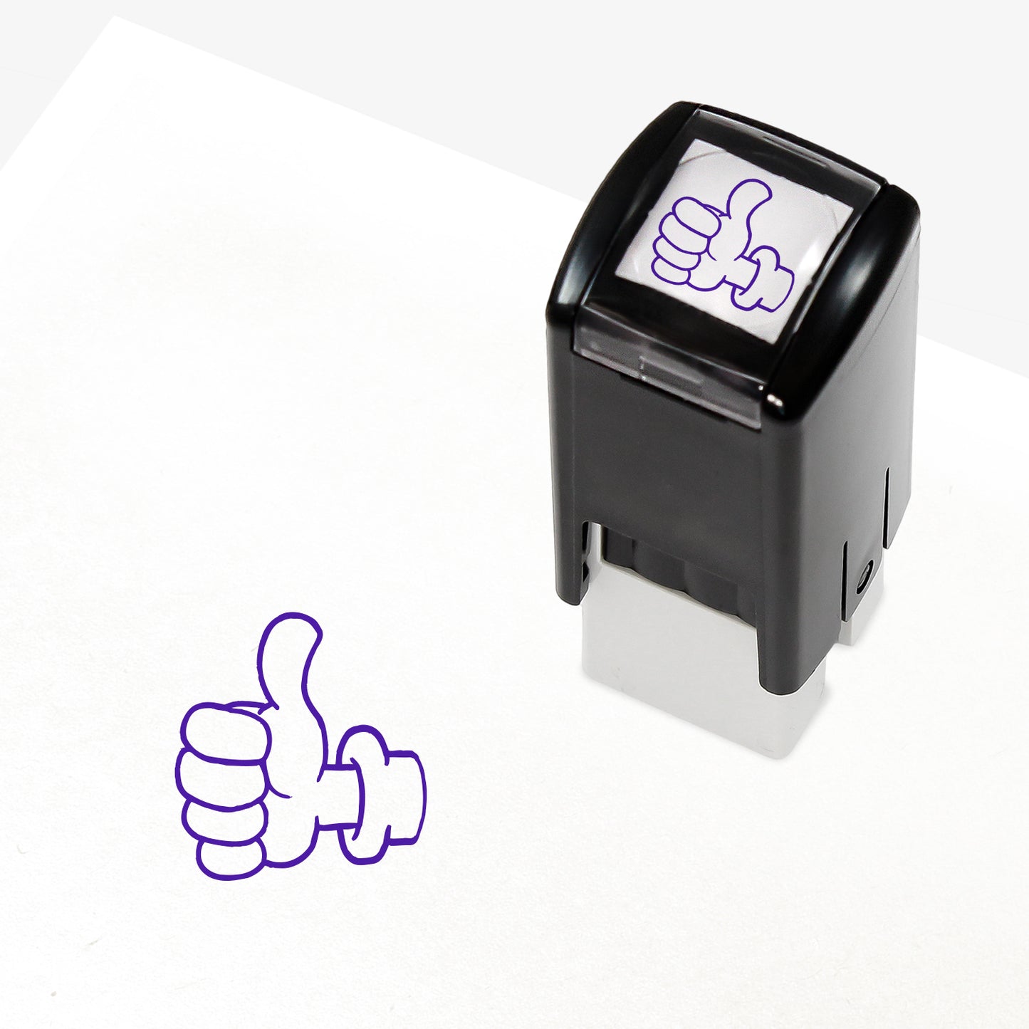 Purple ink 10mm pre-inked stamper featuring a thumbs up icon