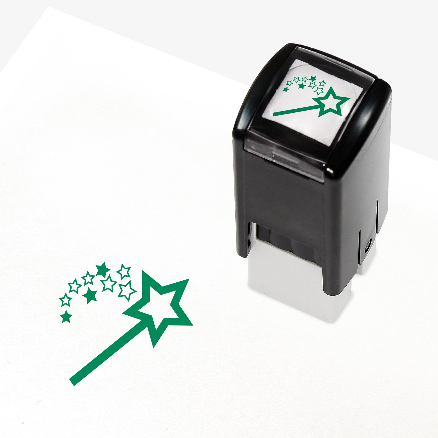 A 10mm self-inking stamp with a green wand emitting a shower of stars.