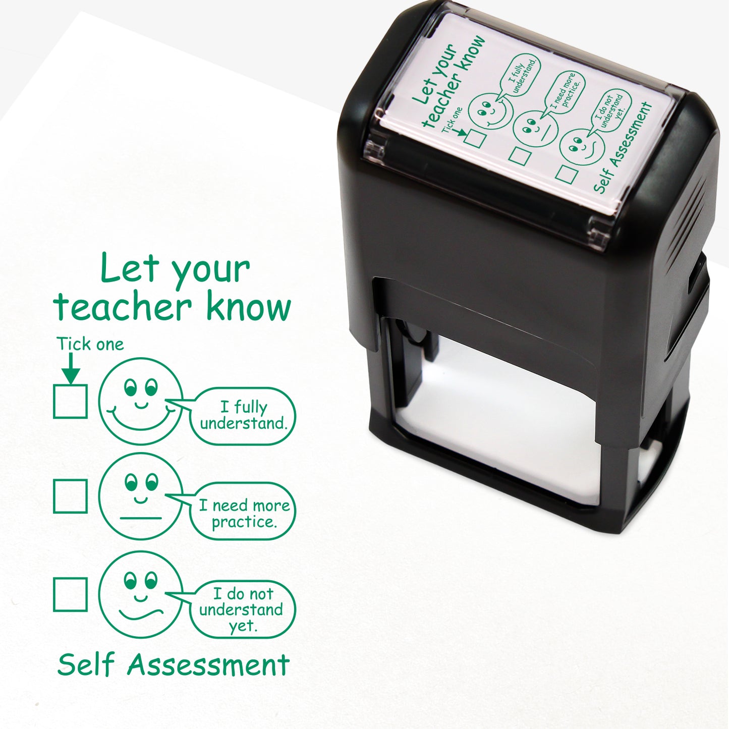 Rectangular, green self-inking teacher stamp (42mm x 22mm) designed for pupil self-assessment. The stamped image includes the heading 'Let your teacher know' with three tick-box options next to smiley faces: 'I fully understand', 'I need more practice', and 'I do not understand yet.' The phrase 'Self Assessment' appears at the bottom. 
