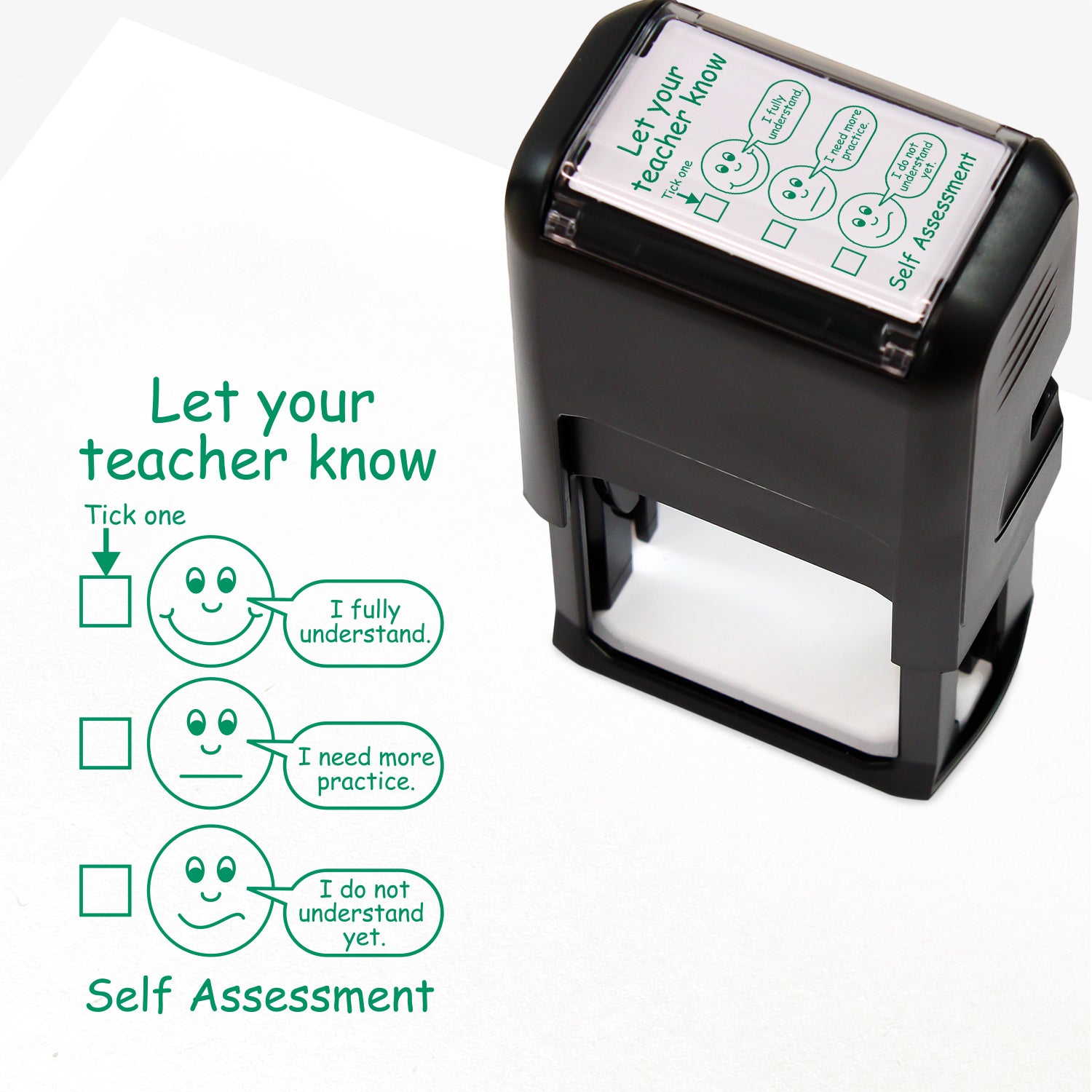 Rectangular, green self-inking teacher stamp (42mm x 22mm) designed for pupil self-assessment. The stamped image includes the heading 'Let your teacher know' with three tick-box options next to smiley faces: 'I fully understand', 'I need more practice', and 'I do not understand yet.' The phrase 'Self Assessment' appears at the bottom. 
