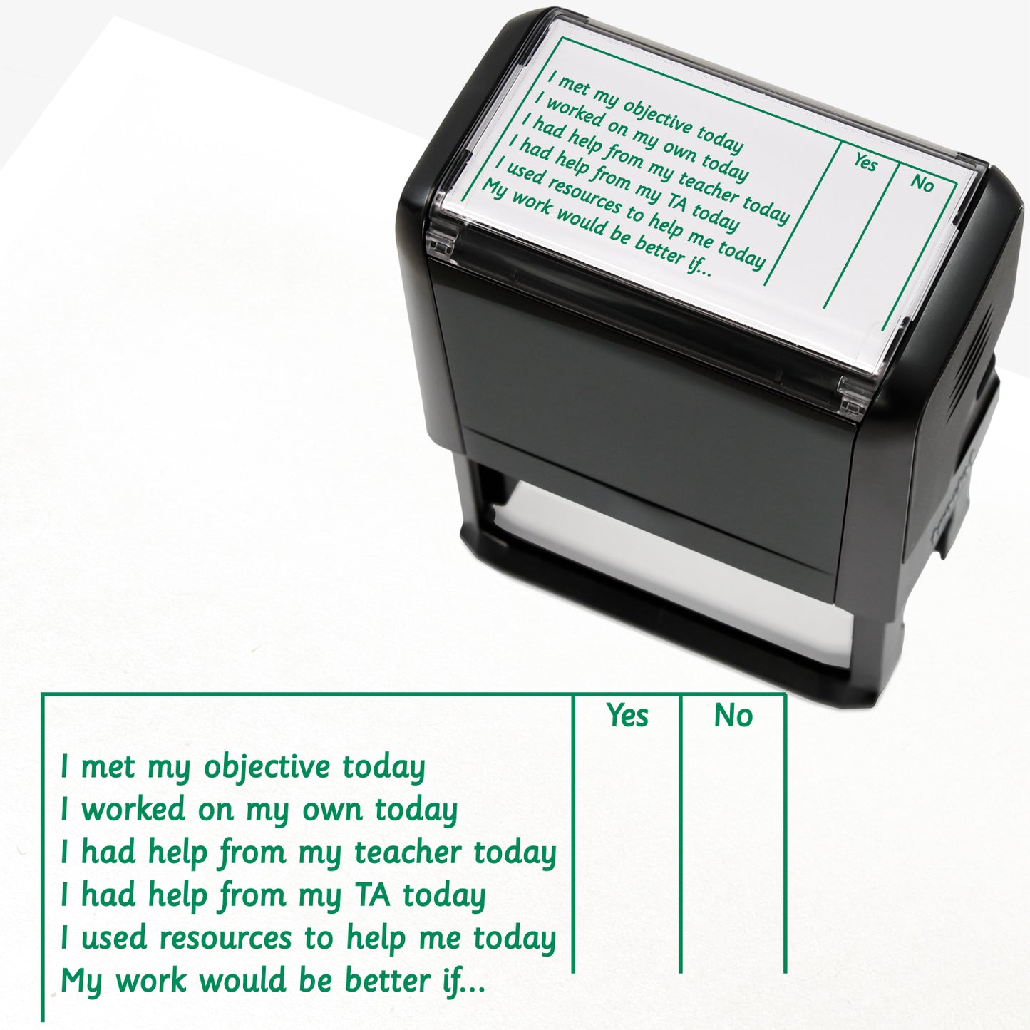 Rectangular, green self-inking teacher stamp (72mm x342mm) featuring a pupil reflection checklist with 'Yes' and 'No' columns. Statements include: 'I met my objective today', 'I worked on my own today', 'I had help from my teacher today', 'I had help from my TA today', 'I used resources to help me today', and 'My work would be better if…'.