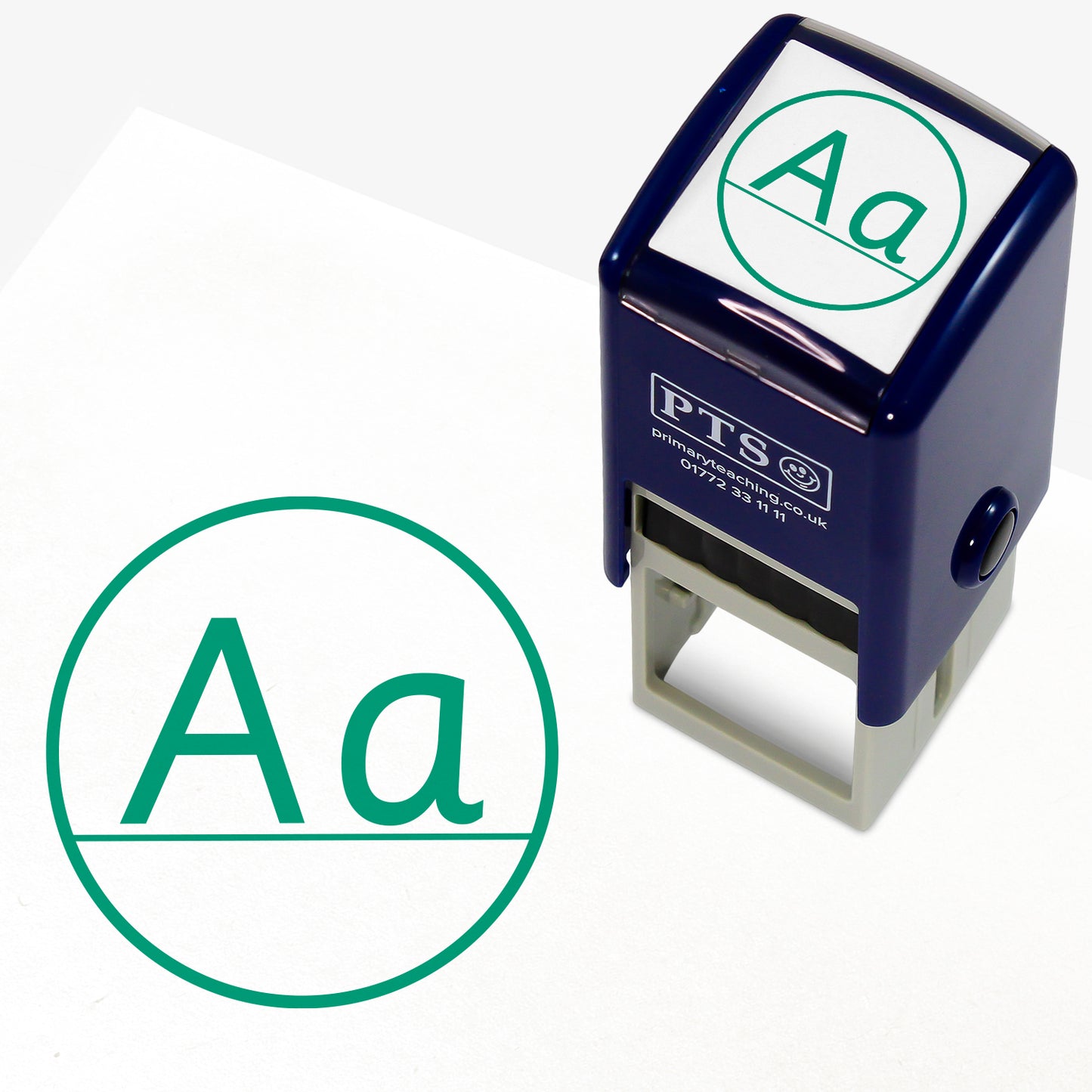 Aa Capital/Lower Case Stamper – 25mm green pre-inked teacher stamp featuring 'A' and 'a' on a line within a solid circle