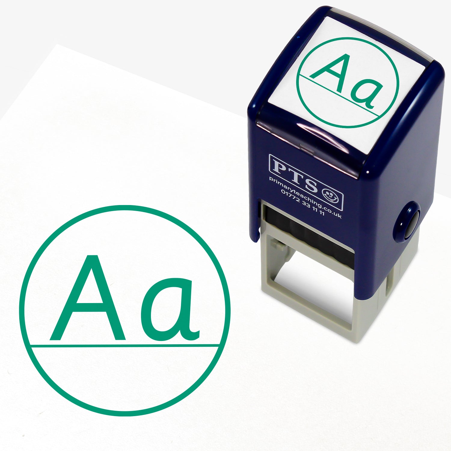 Aa Capital/Lower Case Stamper – 25mm green pre-inked teacher stamp featuring 'A' and 'a' on a line within a solid circle