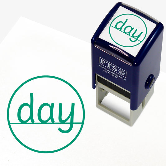Ascenders and Descenders Stamper – 25mm green pre-inked teacher stamp featuring a line with the word 'day' showing where the letters sit on the line.