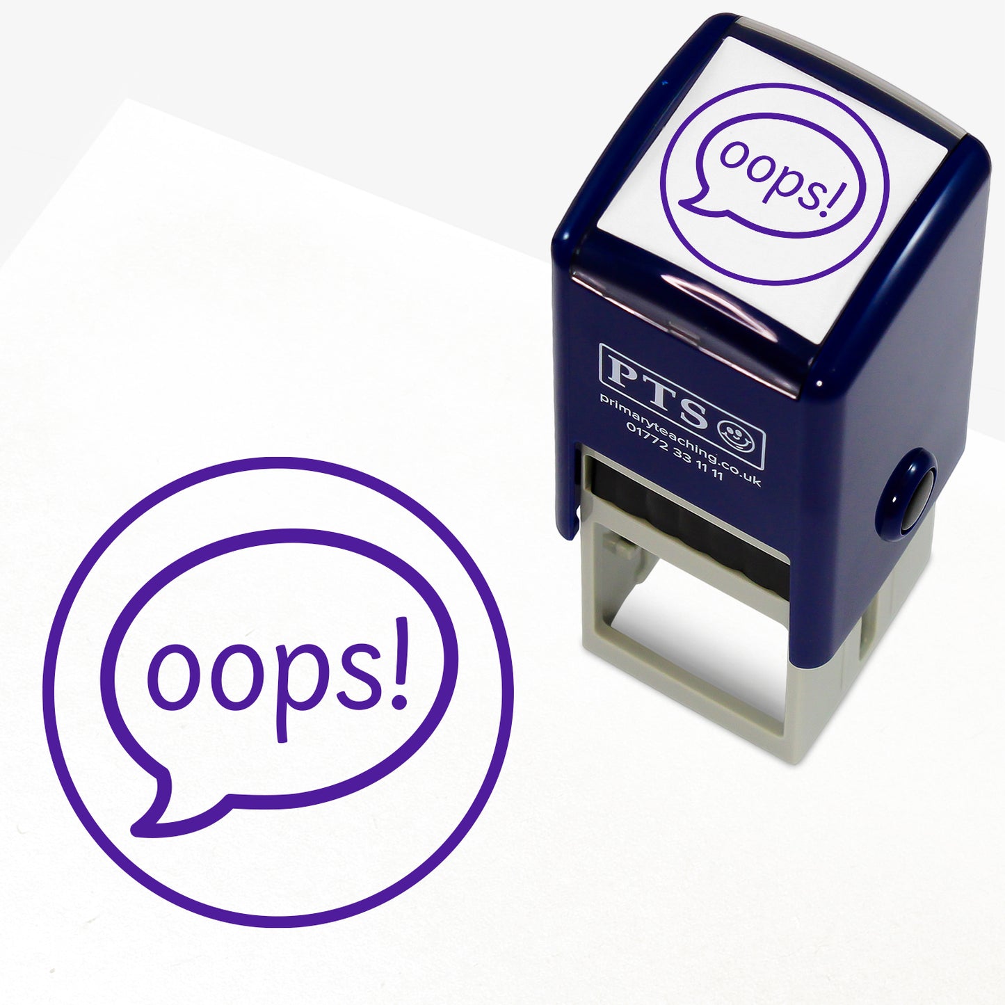 Oops Stamper – 25mm pre-inked teacher stamp featuring a purple speech bubble saying 'oops!' within a circle.
