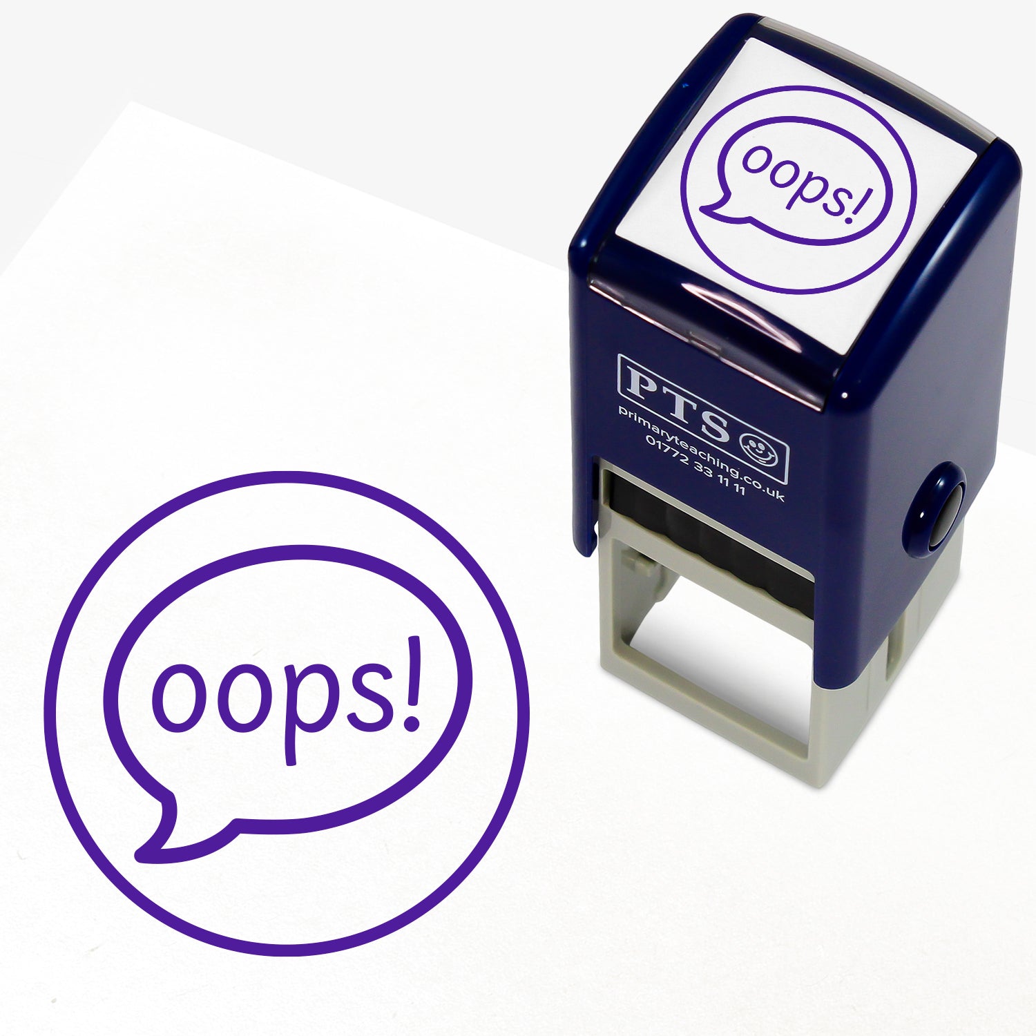 Oops Stamper – 25mm pre-inked teacher stamp featuring a purple speech bubble saying 'oops!' within a circle.
