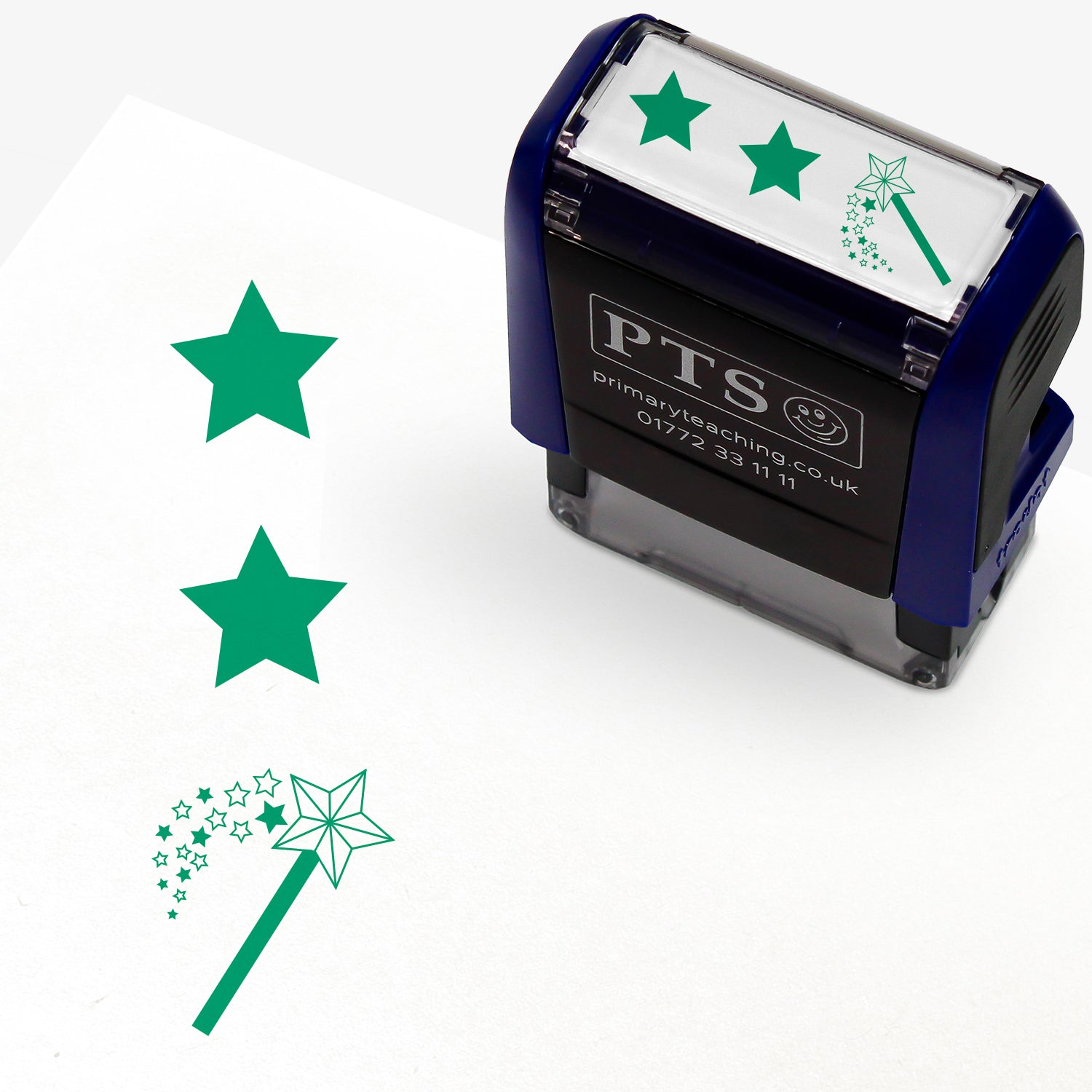 A rectangular pre-inked teacher stamper measuring 38mm x 15mm, featuring a purple vertical impression: a star at the top, a star in the middle and a wand with a shower of stars underneath.