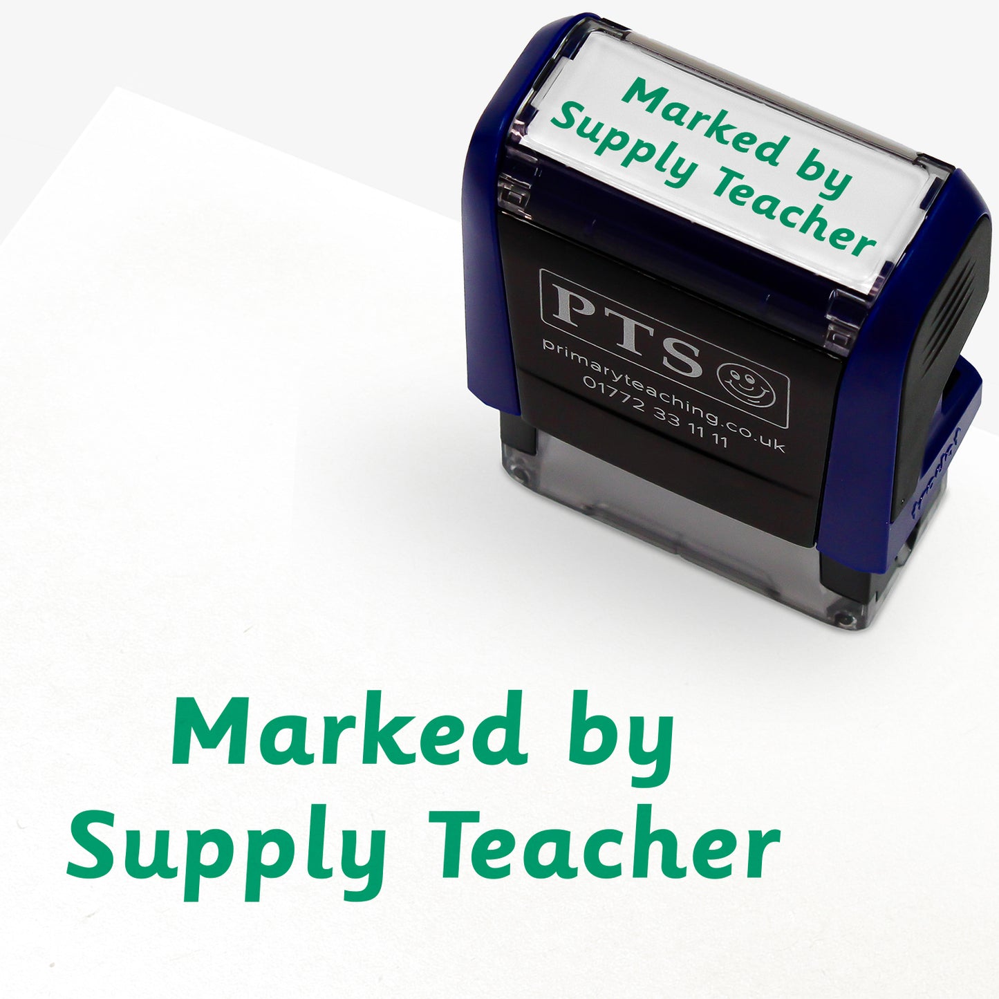 Rectangular self-inking stamper measuring 38mm by 15mm, featuring the phrase 'Marked by Supply Teacher' in green text .