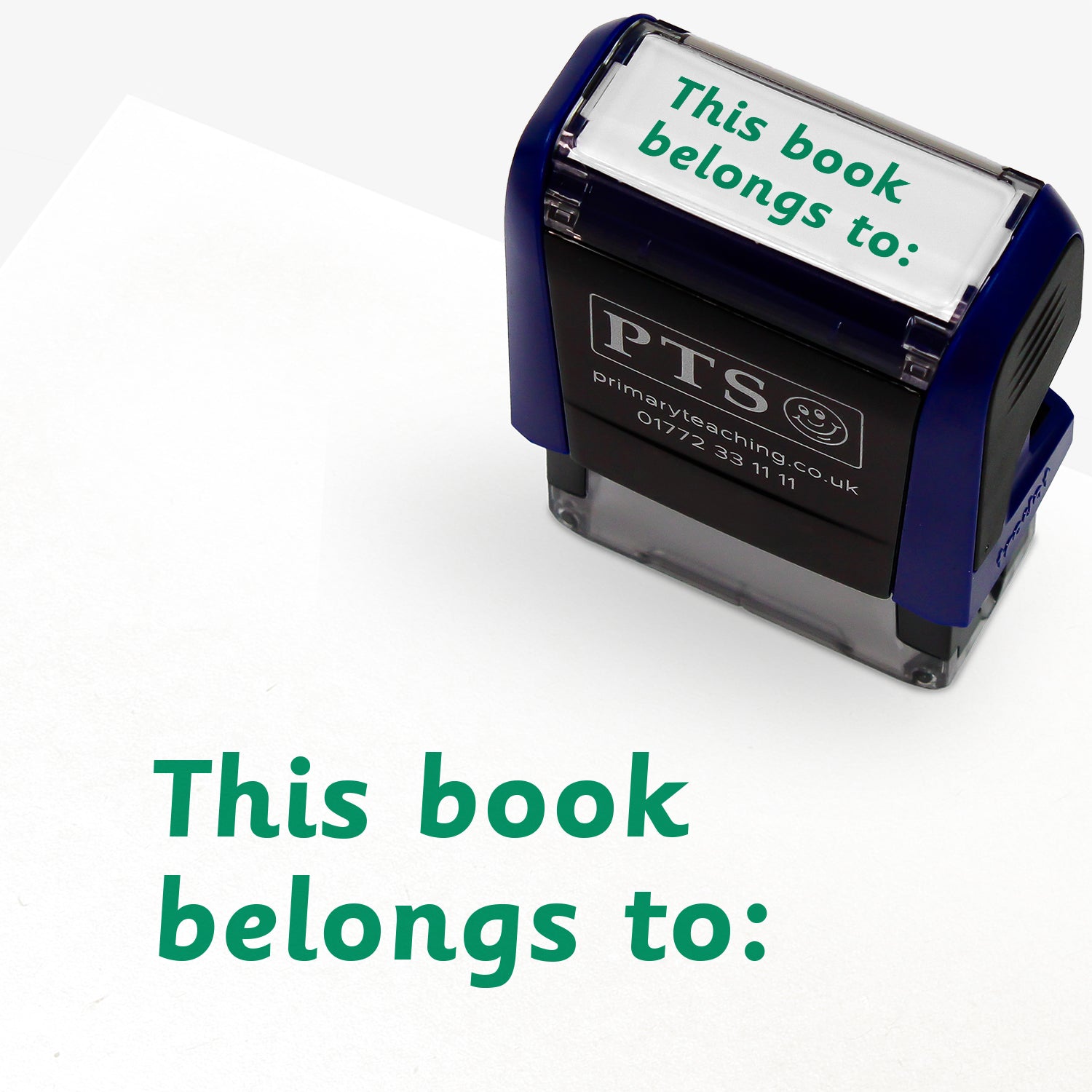 Rectangular self-inking stamper with green ink measuring 38mm by 15mm, featuring the phrase 'This book belongs to:' across two lines.