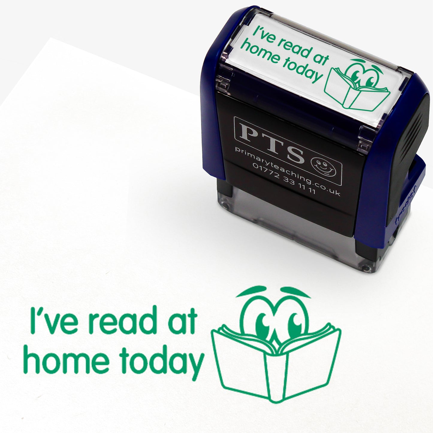 Rectangular self-inking stamper measuring 38mm by 15mm, featuring the phrase 'I've read at home today' in green text next to an illustration of an open book with 2 eyes peering over.
