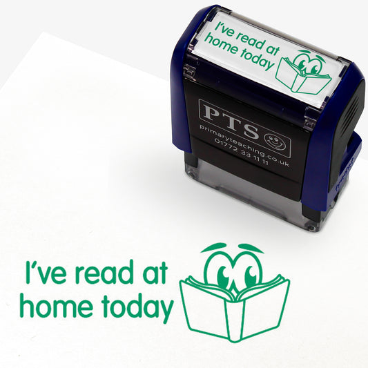 Rectangular self-inking stamper measuring 38mm by 15mm, featuring the phrase 'I've read at home today' in green text next to an illustration of an open book with 2 eyes peering over.