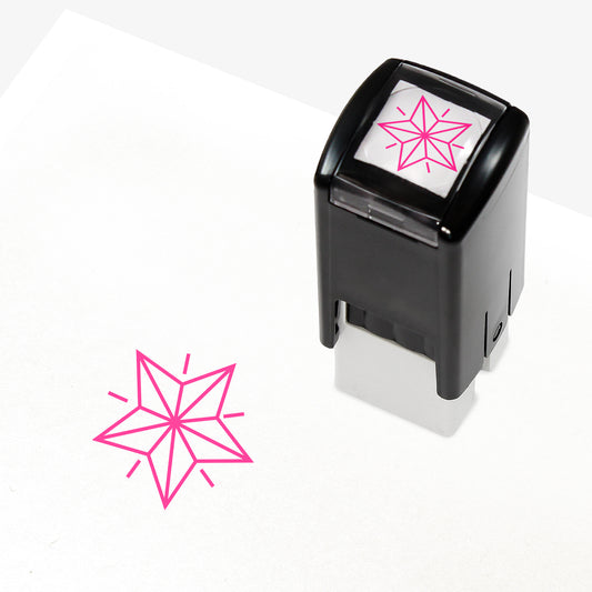 A 10mm self-inking stamp with a pink outline 3D style star central to the design.