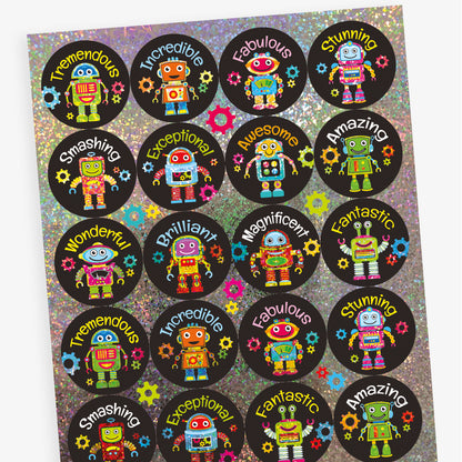 A sheet of circular reward stickers with a black background, each featuring a colourful holographic cartoon robot and positive words such as 'Smashing', 'Wonderful', 'Tremendous', and 'Brilliant'. Surrounding each robot are small, colourful gear icons.
