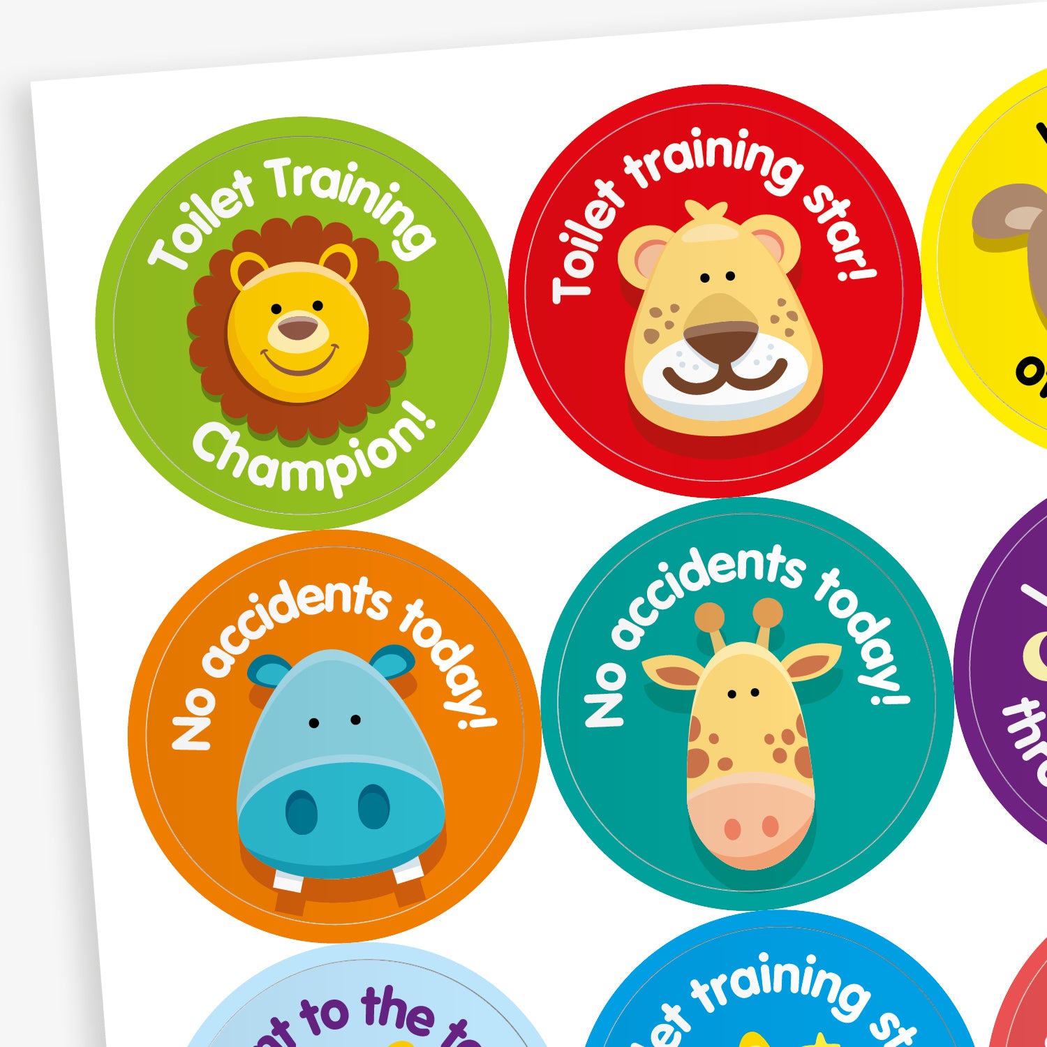Sheet of round toilet training reward stickers featuring cartoon animals and encouraging messages. Designs include a lion with 'Toilet Training Champion!', a lion with 'Toilet training star!', a hippo and giraffe with 'No accidents today!', all in vibrant colours with playful fonts.