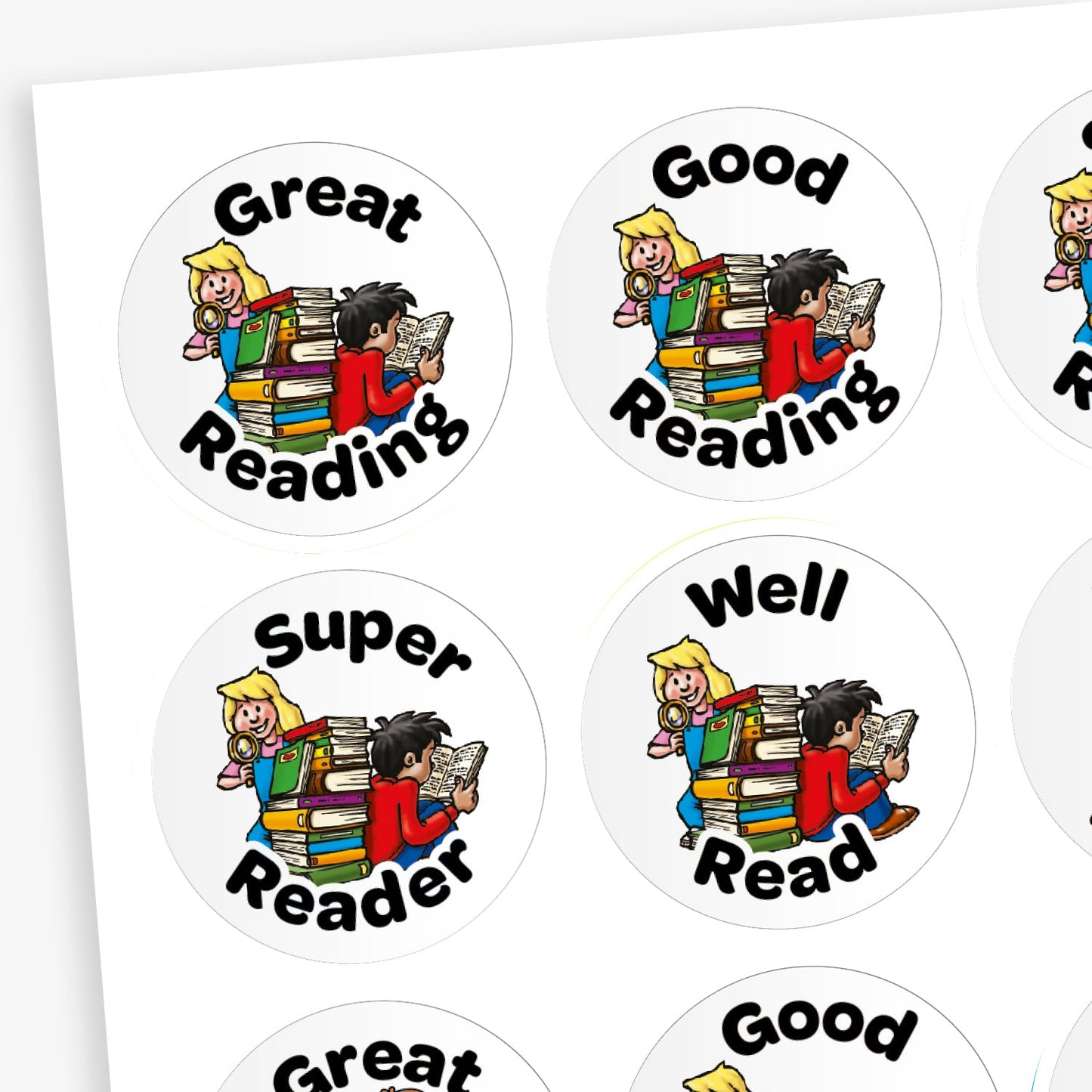 A sheet of circular reading reward stickers featuring an illustration of two children—a blonde girl and a dark-haired boy—sitting back-to-back on a stack of books, each reading. The stickers include phrases in bold black text such as 'Great Reading', 'Good Reading', 'Super Reader', and 'Well Read'.