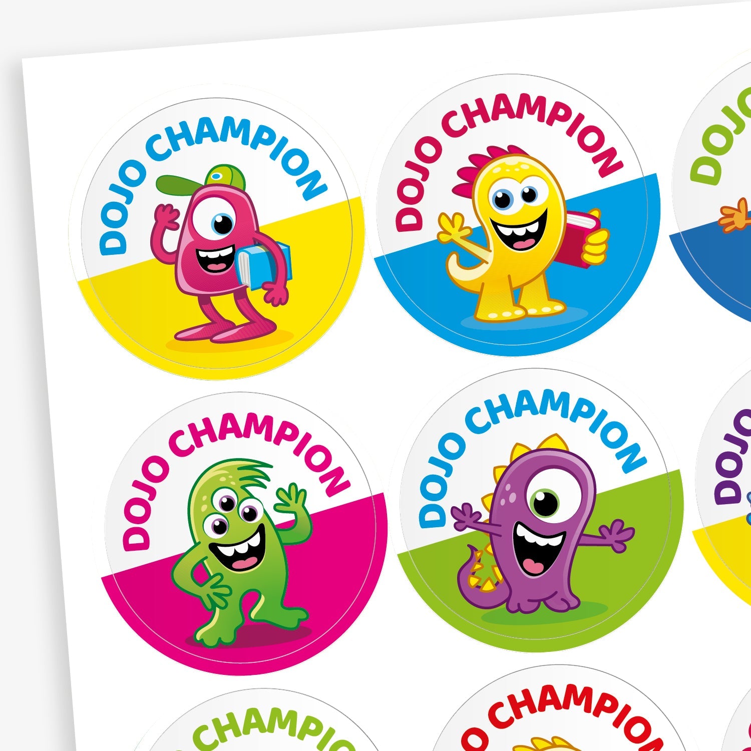 Sheet of 32mm circular stickers.  Each has a colourful monster as a central image, the bottom half of the sticker is a block colour such as yellow, cyan, magenta or green and the top has the phrase 'DOJO CHAMPION'