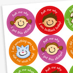 Sheet of 32mm round stickers each with a character's face (Cat, boy, girl, dog) central to a colourful background with phrases surrounding the image, such as 'Ask me why I got this sticker' and 'I did something very well ask me what it was!'