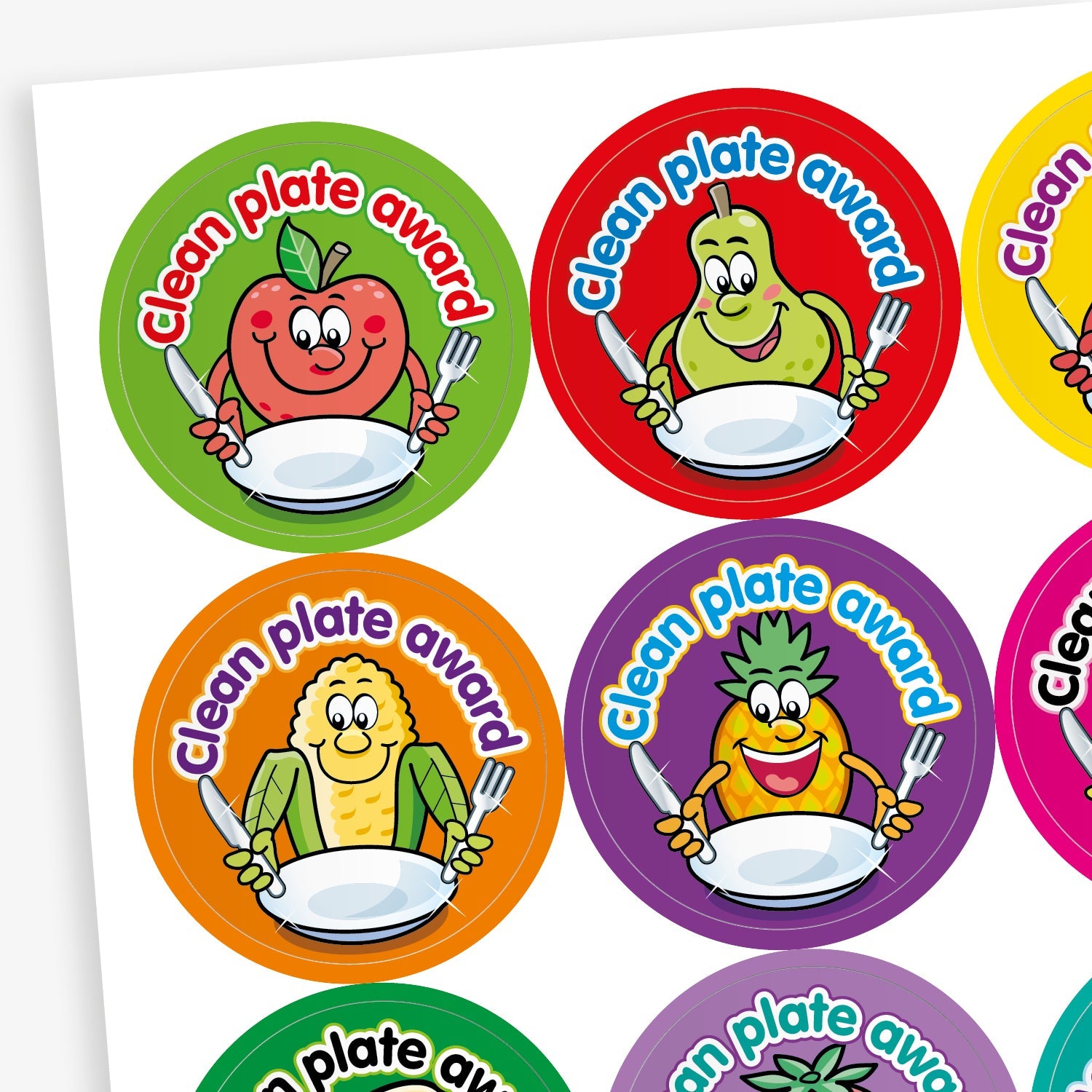 A sheet of colourful circular 'Clean Plate Award' stickers featuring smiling cartoon fruits and vegetables, such as an apple, pear, corn, and pineapple, each holding a knife and fork with an empty plate. Background colours include green, red, orange, and purple.