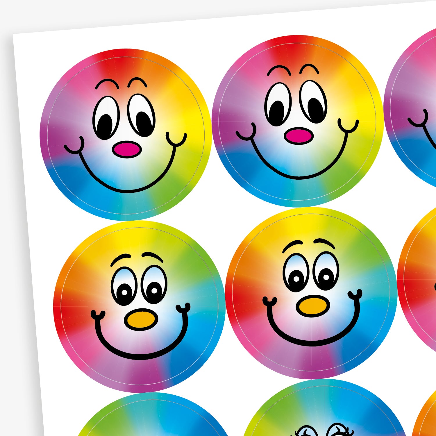A sheet of stickers with a rainbow spectrum background with a smiling face central to the design.
