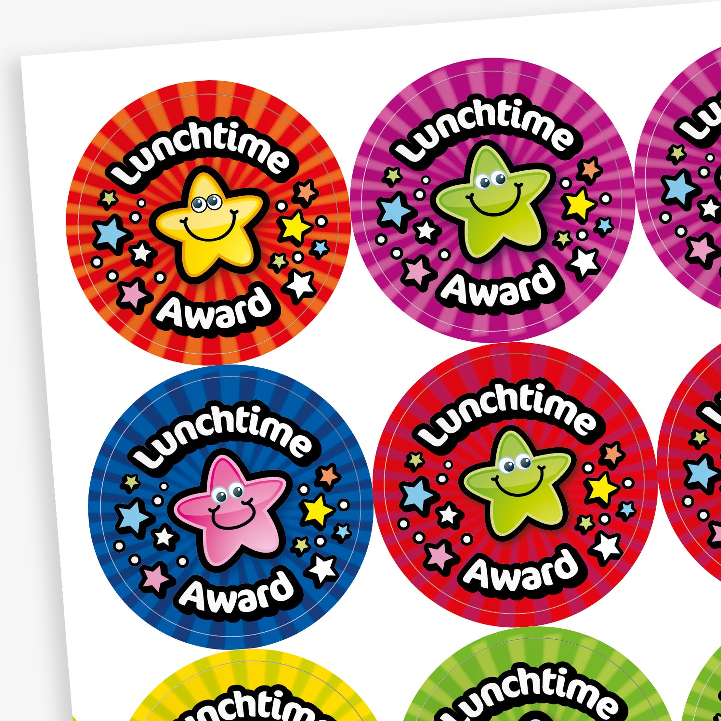 A sheet of brightly coloured circular stickers with the phrase 'Lunchtime Award' in bold white text on a black curved banner. Each sticker features a smiling cartoon star character in the centre, surrounded by colourful stars. Background colours include red, purple, blue, yellow, and green, with vibrant radial patterns that create a cheerful and eye-catching effect.