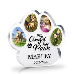 Memorial ornament shaped like a paw with photos of a dog and text 'My Angel has Paws' on a white background.