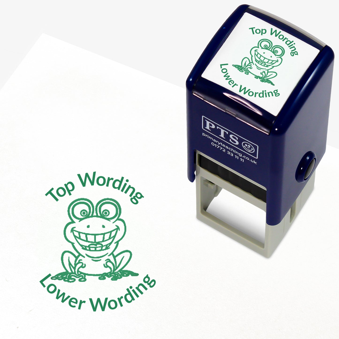 A 25mm round pre-inked teacher stamper with green ink, featuring an smiling frog, curving above the image is space for personalisation 'Top Wording' and curving below the image is space for personalisation 'Lower Wording' in a clear, bold font.