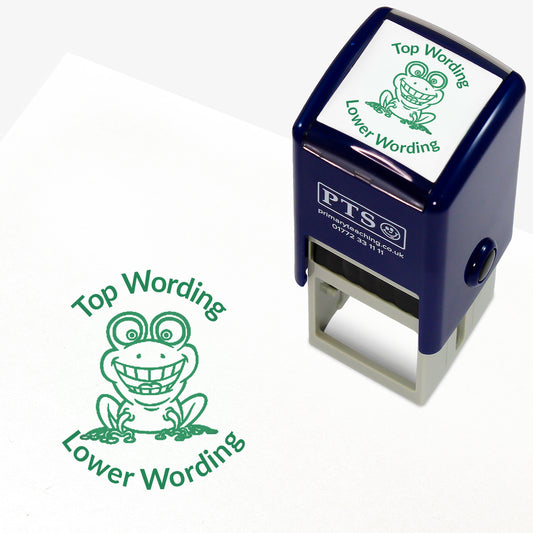 A 25mm round pre-inked teacher stamper with green ink, featuring an smiling frog, curving above the image is space for personalisation 'Top Wording' and curving below the image is space for personalisation 'Lower Wording' in a clear, bold font.