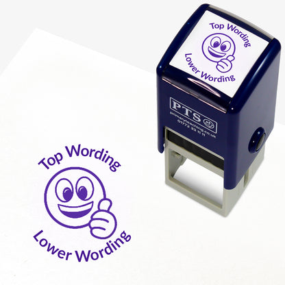 A 25mm round pre-inked teacher stamper with purple ink, featuring a smiling emoji giving a thumbs up, curving above the image is space for personalisation 'Top Wording' and curving below the image is space for personalisation 'Lower Wording' in a clear, bold font.