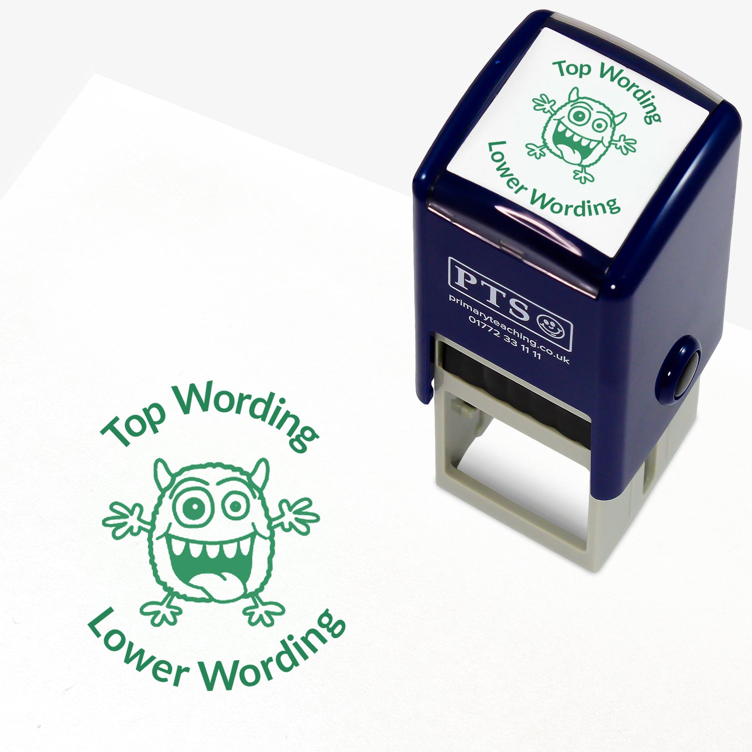 A 25mm round pre-inked teacher stamper with green ink, featuring a monster with it's arms open wide and it's mouth open, curving above the image is space for personalisation 'Top Wording' and curving below the image is space for personalisation 'Lower Wording' in a clear, bold font.