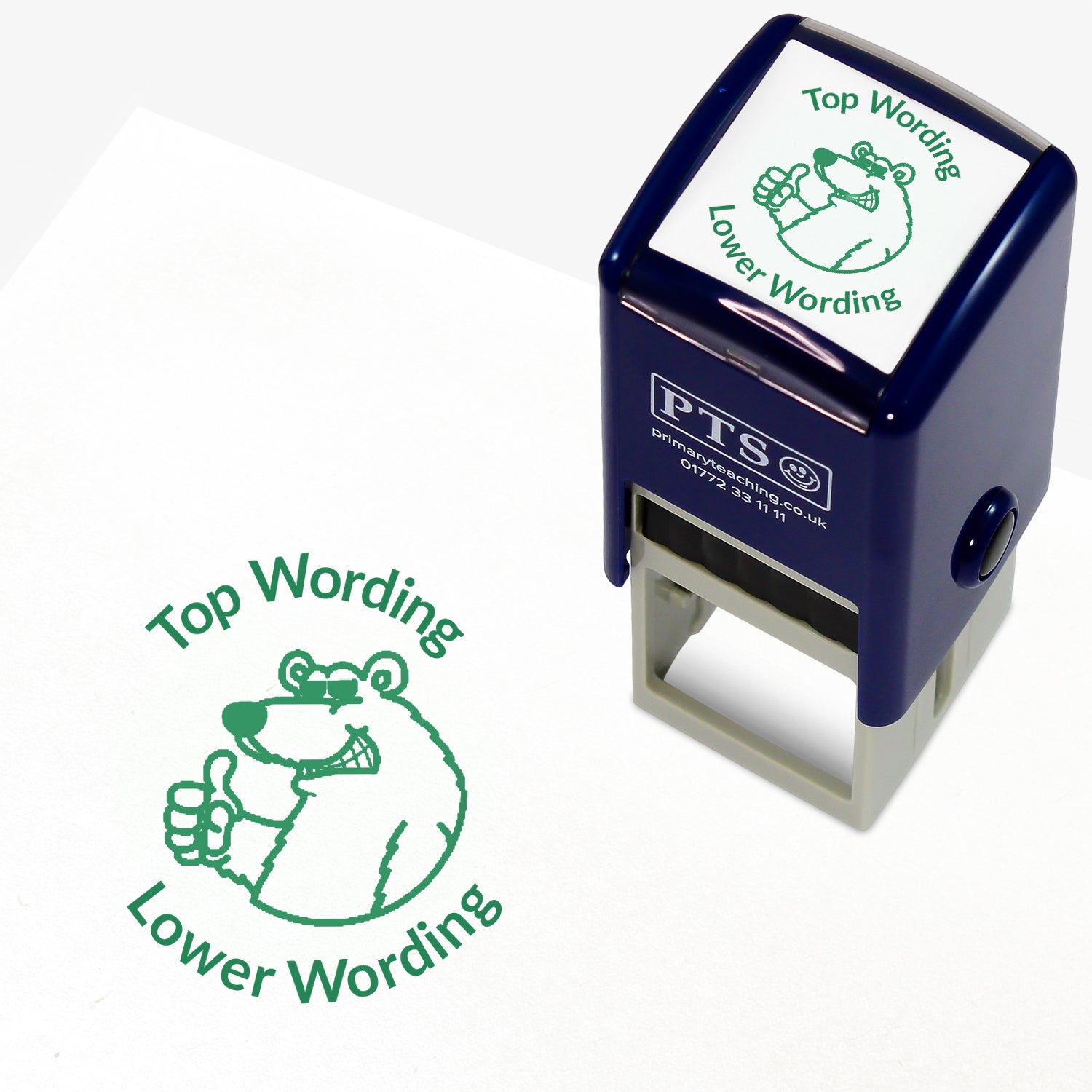A 25mm round pre-inked teacher stamper with green ink, featuring a smiling polar bear, wearing sunglasses with a thumbs up; curving above the image is space for personalisation 'Top Wording' and curving below the image is space for personalisation 'Lower Wording' in a clear, bold font.