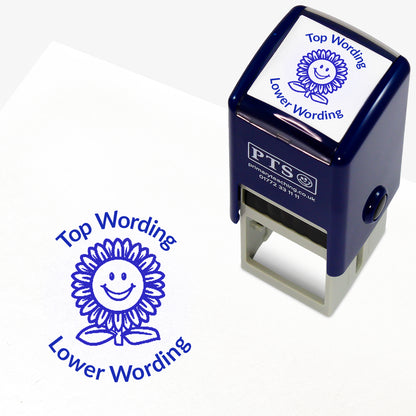 A 25mm round pre-inked teacher stamper with blue ink, featuring a smiling sunflower, curving above the image is space for personalisation 'Top Wording' and curving below the image is space for personalisation 'Lower Wording' in a clear, bold font.