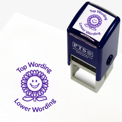 A 25mm round pre-inked teacher stamper with purple ink, featuring a smiling sunflower, curving above the image is space for personalisation 'Top Wording' and curving below the image is space for personalisation 'Lower Wording' in a clear, bold font.