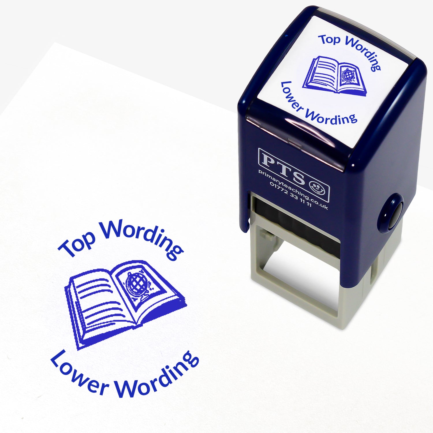 A 25mm round pre-inked teacher stamper with blue ink, featuring a open book with lines on the left page and a picture of a globe on the right page, curving above the image is space for personalisation 'Top Wording' and curving below the image is space for personalisation 'Lower Wording' in a clear, bold font.