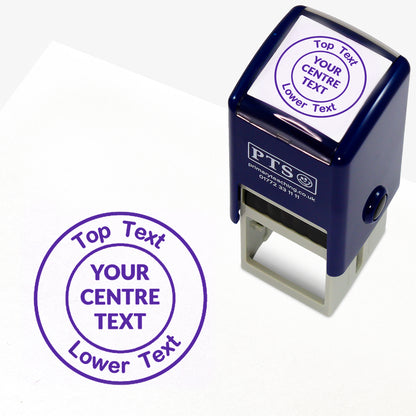 A 25mm round pre-inked  stamper with purple ink, featuring a centre circle within which the wording is 'YOUR CENTRE TEXT' and the outer circle curving above the text is space for further personalisation 'Top Text' and curving below 'Lower Text' in a clear, bold font.