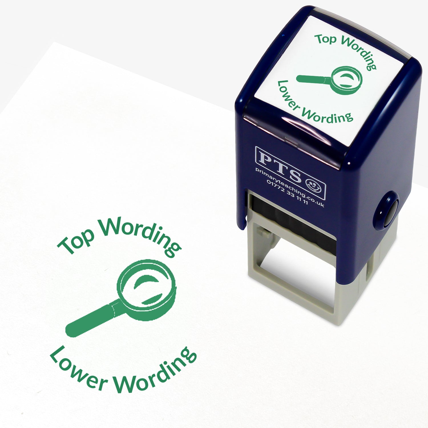 A 25mm round pre-inked teacher stamper with green ink, featuring a magnifying glass, curving above the image is space for personalisation 'Top Wording' and curving below the image is space for personalisation 'Lower Wording' in a clear, bold font.